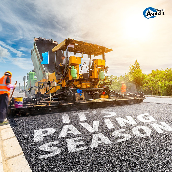 It's Paving Season caption with a crew and paver paving the road